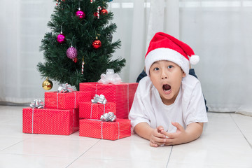 Asian Chinese little boy showing funny expression with Christmas