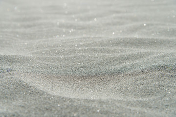 Close up sand dune with blue background 