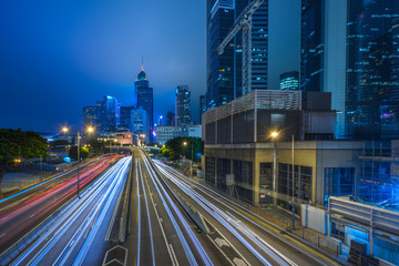 Fototapeta premium Traffic light trails in downtown of Hong Kong,China.