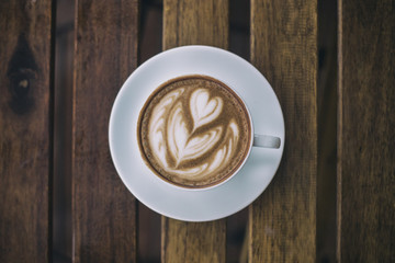 Hot Mocca offee on a wooden table background