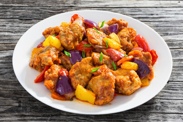 Sweet and Sour fried pork chunks with vegetables