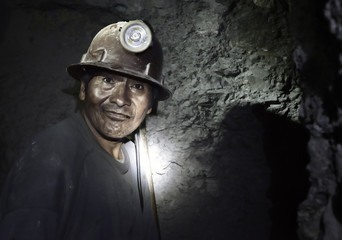 Portrait of a miner inside Cerro Rico silver mine. October 8, 2012 - Potosi, Bolivia