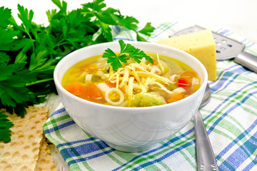 Soup Minestrone in white bowl on napkin
