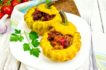 Squash yellow stuffed in plate on light board