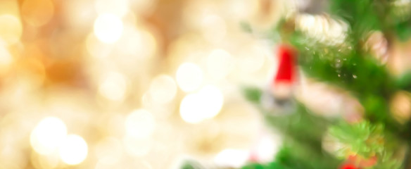 Blur Christmas tree and gold bokeh, festive background