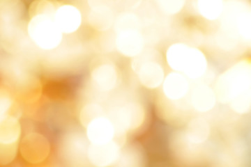 Obraz premium Abstrakcjonistyczny złoty bokeh tło