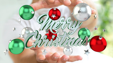 Businessman holding floating christmas message in his hand 3D re