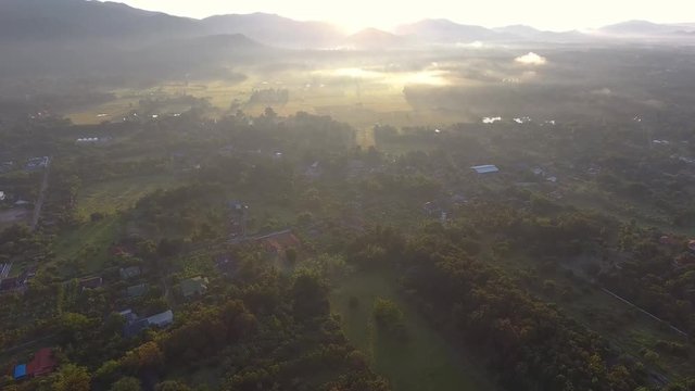 Aerial Views Flight over the Mountains. Flying over the River. Forest Valley. Morning Fog. Mae Kuang dam Chiangmai Thailand.