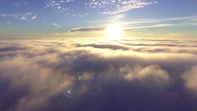 flyig above clouds at morning