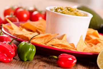 Guacamole and nacho chips. 
