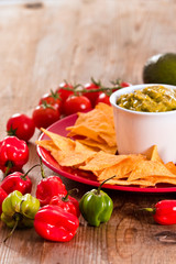 Guacamole and nacho chips. 