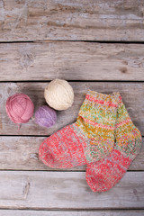 Fototapeta na wymiar Knitted handmade woolen socks.
