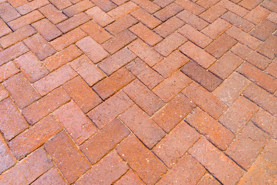 Red Brick Paving Stones On A Sidewalk