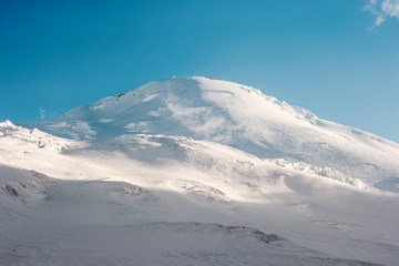 Fototapeta na wymiar Elbrus Mountain summit glacier Landscape Travel serene scenic view blue sky