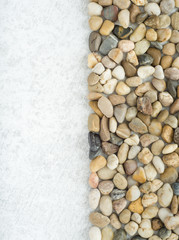 Fototapeta na wymiar Stones on stone background, concept of harmony and tranquility. Decoration with stone pebbles as natural design backdrop with copy space.