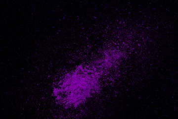 Explosion of purple powder, isolated on black  background.jpg