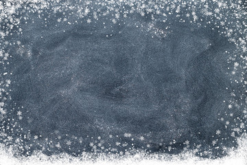 Snowflakes on a black chalkboard