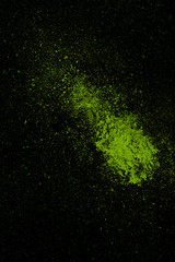 Fototapeta na wymiar Green colorful powder splash isolated on black background.jpg