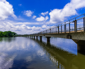 Fototapeta na wymiar Bridge over a lake
