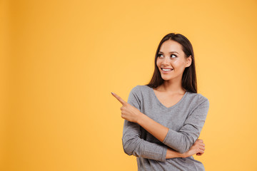 Model pointing to the left