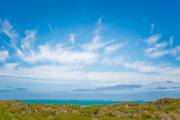 Fototapeta na wymiar blue sky and dramatic cloudy and the beach