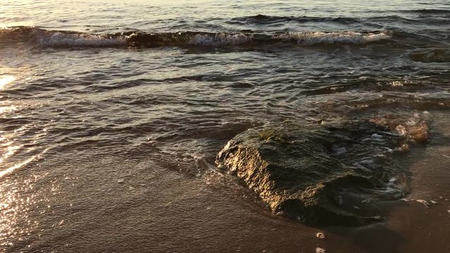 Seamless waves on the foreshore in 4K