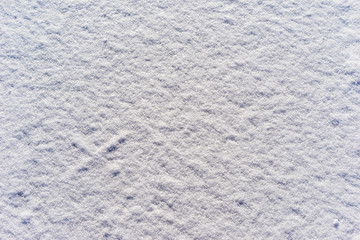 background of fresh snow texture in blue tone.