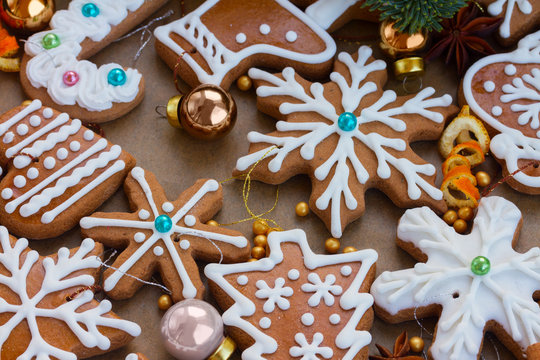 christmas gingerbread frosted cookies with christmas decorations - christmas food background