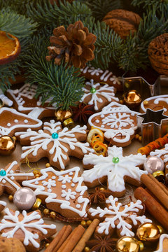 christmas gingerbread cookies with christmas decorations and evergreen fir tree - christmas traditional food