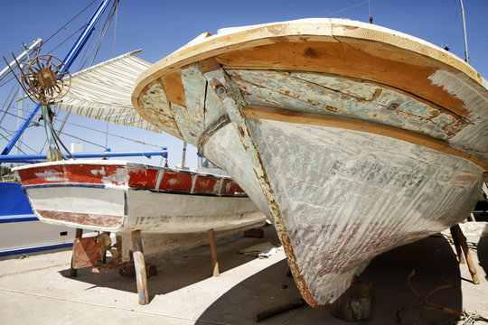 Small Wooden Boats Are Waiting To Be Painted At Dock, Mersin, Turkey