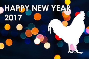 Happy New Year 2017 with Cock on festive Christmas background Rooster is symbol of New 2017 year of red fiery cock.