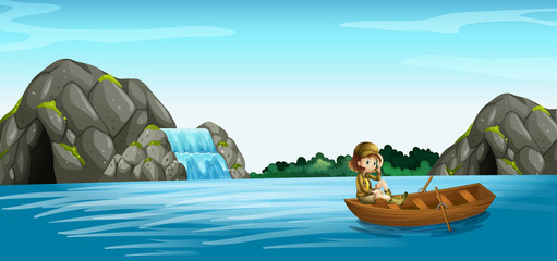 Nature scene with girl in rowboat © GraphicsRF