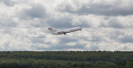 white plane flies up
