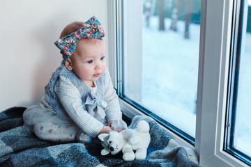 Child on a window sill