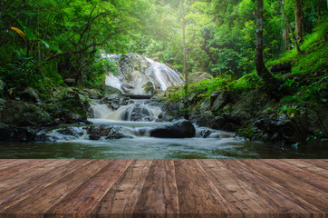 Wood floor perspective and natural mountain waterfall - Powered by Adobe