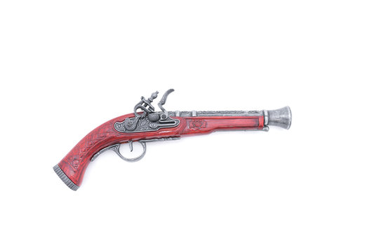Vintage pistol on white background - Prussian antique flintlock pistol with copy space.
