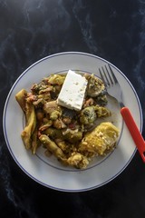 Traditional Greek Green Beans recipe (Fasolakia Giaxni).Green Beans, Chickpeas, Dolmades and Feta in Olive Oil