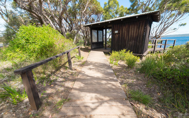 Fototapeta na wymiar visitor information small wooden house on Coalmine Beach , Walpole ,Australia .