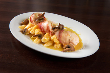Stuffed chicken rolls with mushrooms and potatoes