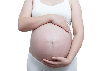 The belly asia pregnant woman holding her belly isolate on white