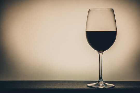 Glass of wine. Alcoholism, toned image