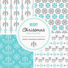 Fototapeta na wymiar Christmas seamless patterns with outlined holiday and winter signs.