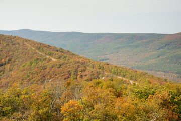 Talimena scenic byway with road running on the crest of the mountain, with fall colors