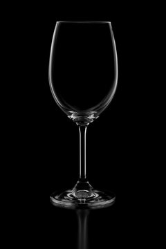empty wine glass isolated on dark background