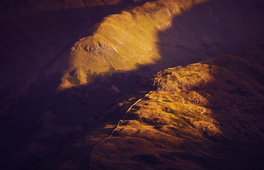 Sunsetting over mountain ridges in the English Lake District, UK