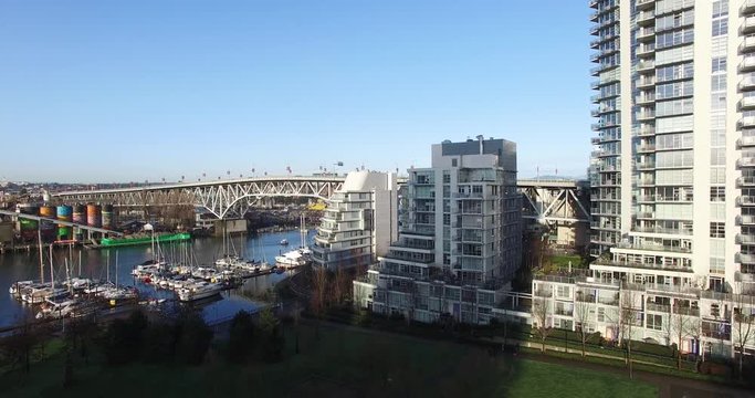 aerial hover granville bridge and modern condos
