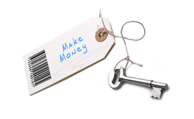 A silver key with a tag attached with a Make Money concept writt