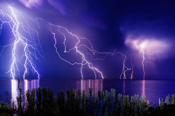 Lightning storm over Black sea near Feodosia - 129448345