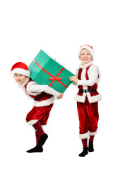 Young happy boys in santa clothes holding Christmas gift box on back. Isolated white background.