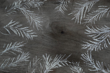 Christmas-tree branch painted with chalk